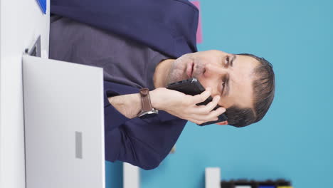 Vertical-video-of-Businessman-getting-good-news-on-the-phone.